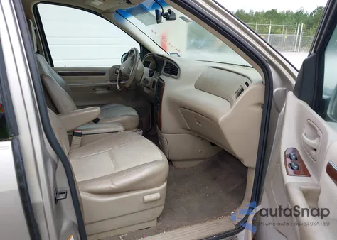 2003 Ford Windstar Limited z USA, uszkodzony, nr VIN 2FMDA58473BB41925